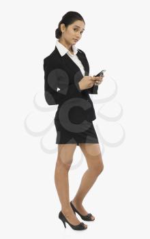 Businesswoman holding a mobile phone