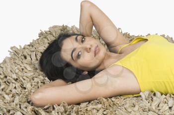 Woman lying on a rug