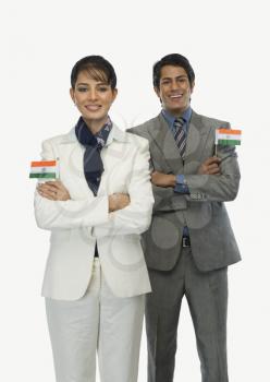 Business executives holding Indian flags