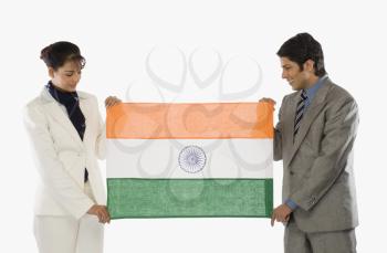 Business executives holding an Indian flag