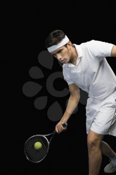 Tennis player playing a shot