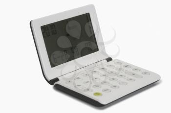 Close-up of a calculator cum alarm clock