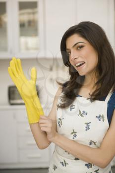 Woman wearing rubber gloves