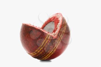 Close-up of a worn out cricket ball