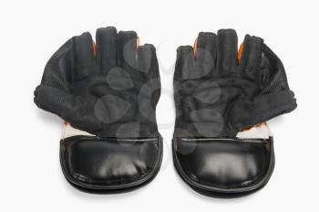 Close-up of a pair of wicket keeping gloves
