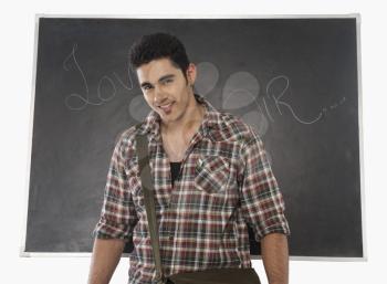 University student smiling in a classroom