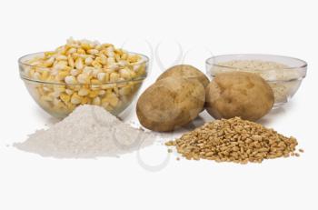 Close-up of raw potatoes with cereals