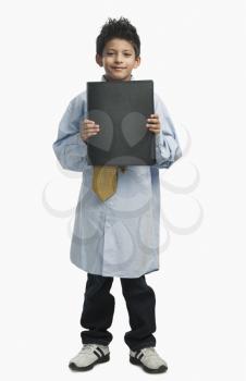Boy dressed as a businessman