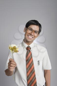 Man holding a flower