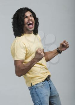 Close-up of a man cheering