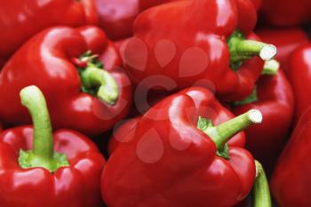 Close-up of red bell peppers at a market stall