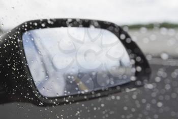 Rain drops on the side-view mirror of a car, Dublin, Republic of Ireland