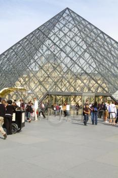 Tourists near a pyramid, Louvre Pyramid, Musee du Louvre, Paris, France
