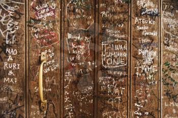 Close-up of a graffiti covered door, Oxford University, Oxford, Oxfordshire, England