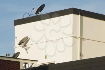 Low angle view of satellite dishes on a house, Tirupati, Andhra Pradesh, India