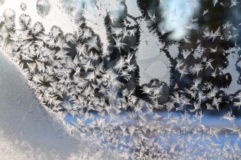 white crystal ice on windowpanes