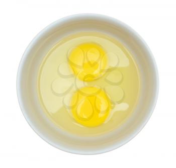Crude eggs in a plate on a white background.                    