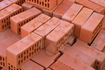 Red bricks silicate with apertures on building.                   