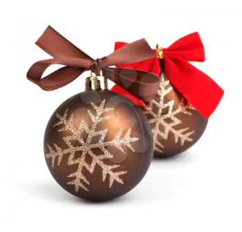 Christmas balls with bow in chocolate tone.