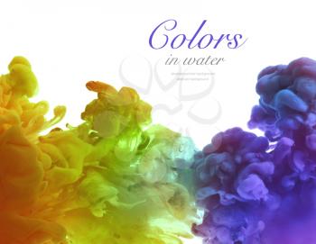 Acrylic colors and ink in water. Abstract smoke background. Isolated on white.