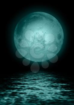 The full moon in the night sky reflected in water