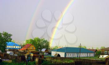 Rainbow on sky after rain.Natural phenomena rainbow on sky