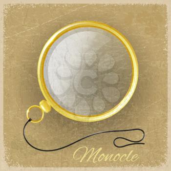 Antique gold monocle on a grunge background