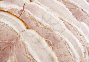 Background with sliced bacon - close-up image