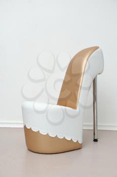 A beautiful and large shoe chair studio interior