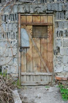 Terrible old door in an abandoned house