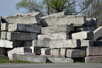 Unused Concrete Blocks for Construction, Stacked in a Pile