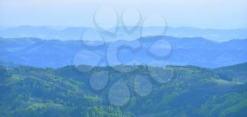 Landscape with hills and blue air, the atmosphere in the European forest of Schwarzwald, Germany. Clean Air Ecology Concept