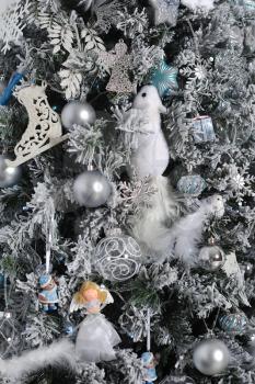 Decorated Christmas tree with different toys, texture