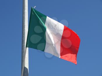 Flag of Italy over blue sky background