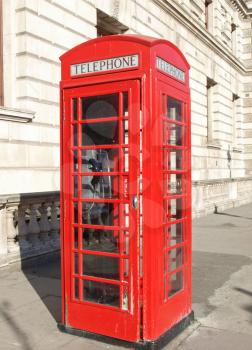 Traditional Red Telephone Box in London, UK