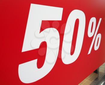 50% discount sign in a shop window