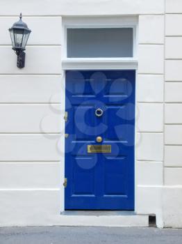 Brightly coloured traditional English house door in London