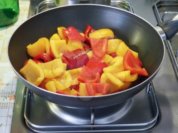 red and yellow peppers (Capsicum) aka bell peppers vegetables vegetarian and vegan food