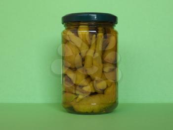 sweet green vinegar peppers in a jar, vegetarian and vegan food