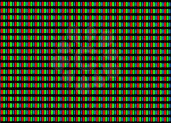 Light photomicrograph of a mobile LCD screen seen through a microscope