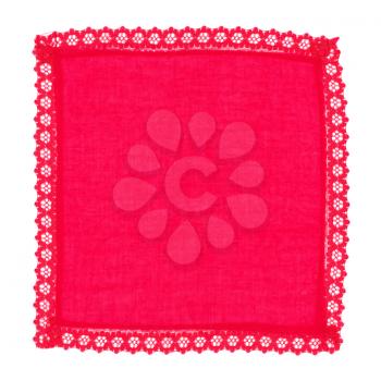 decorated ornamental doily in red fabric over white