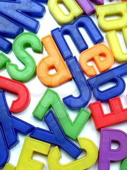 English alphabet letters in plastic toy characters