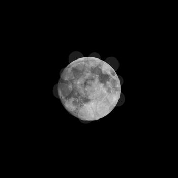 Full moon seen with an astronomical telescope, high resolution, in black and white - with copy space