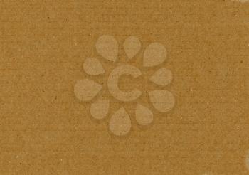 grunge brown corrugated cardboard texture useful as a background