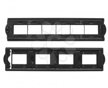 Holder for mounted reversal film slides and 35mm film strip isolated over white