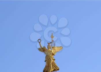 Berlin Angel statue in the Tiergarten park - over blue sky background - with free blank copy space