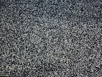 Vintage analog TV screen static noise useful as a background