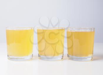 Glasses of pineapple juice on continental breakfast table
