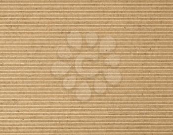 brown corrugated cardboard texture useful as a background, horizontal lines