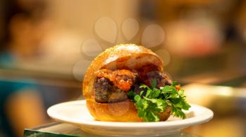 Beef meat burger with tomato sauce